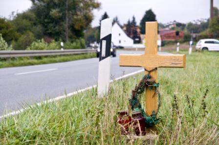 roadside marker for victim who died in car accident